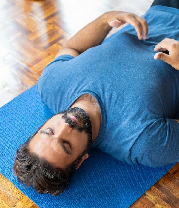Person practicing mindfulness and eye relaxation exercises